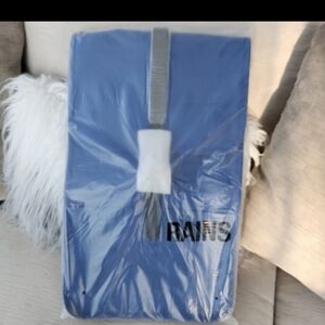 RAINS Blue and Black Roll-Top Backpack